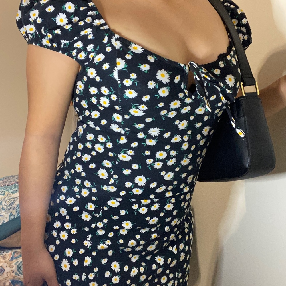 Tight black and white floral dress.